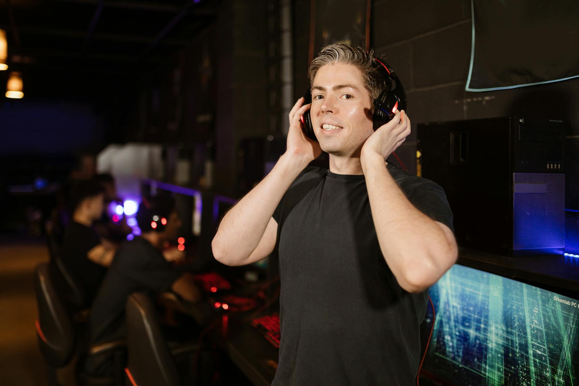 Professional gaming headset on desk with RGB lighting for competitive gaming communication
