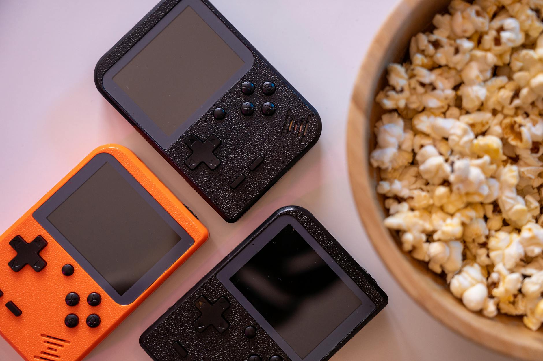 Modern gaming console with controller on entertainment center
