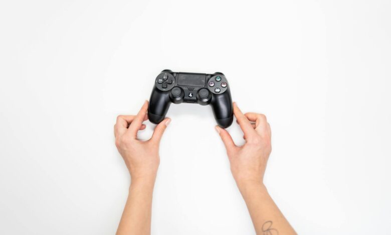 Gaming controller and console representing the video game industry merger landscape