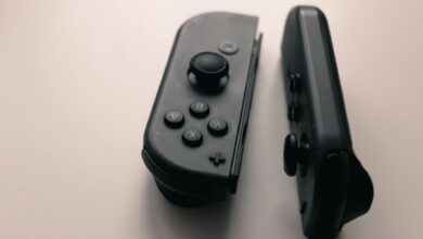 Close-up view of gaming controller showing detailed buttons and design