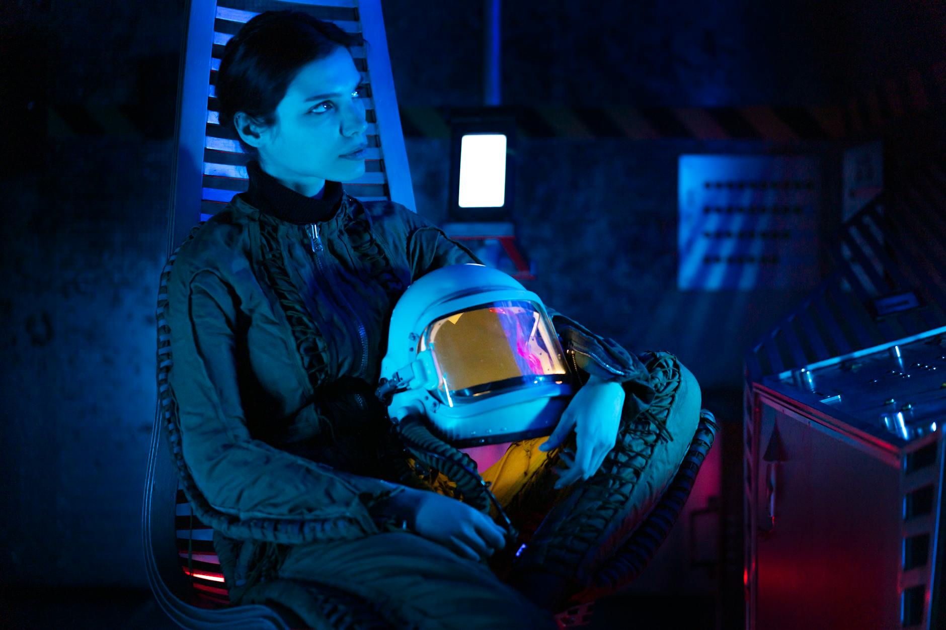 Futuristic spacecraft cockpit interior with control panels and displays