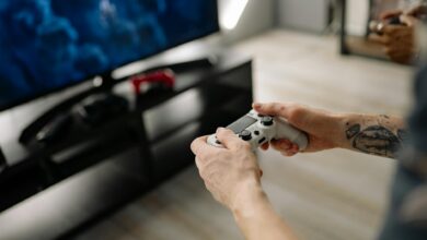 Modern gaming console setup with multiple storage devices and cables