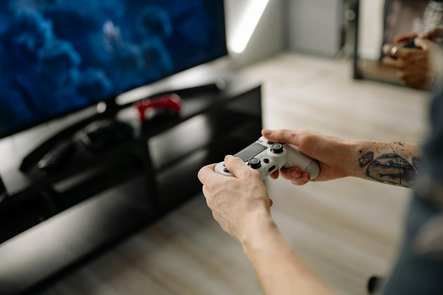 Modern gaming console setup with multiple storage devices and cables