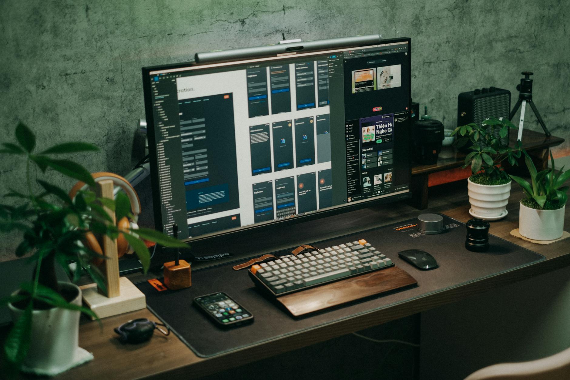 Gaming computer setup with monitor displaying system settings optimization interface
