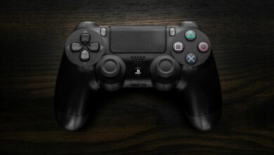 Gaming controller in atmospheric lighting representing survival horror gaming experience