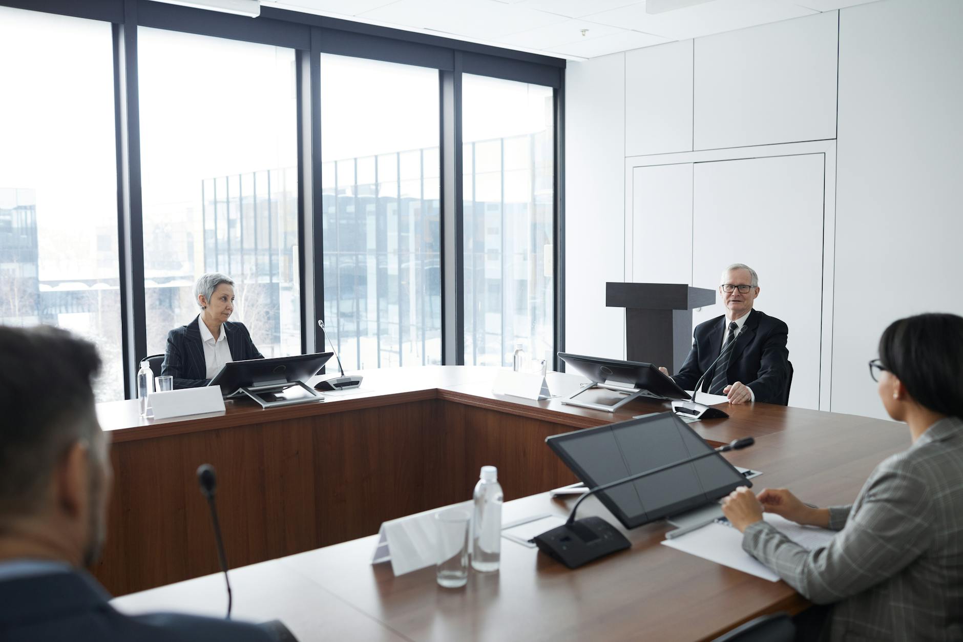 Business professionals in meeting discussing strategic partnerships
