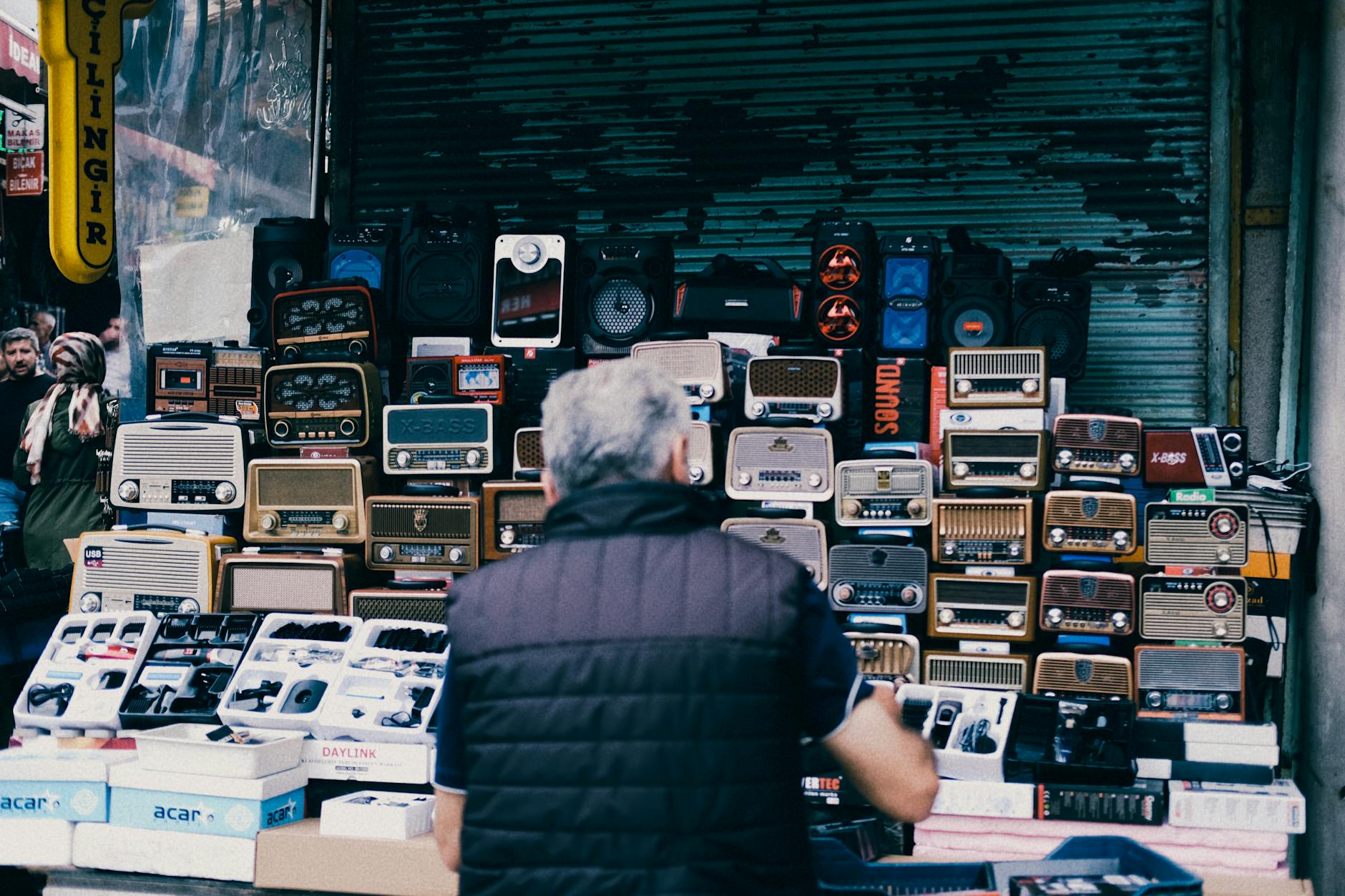 Retail electronics display showing gaming hardware and competitive pricing strategies