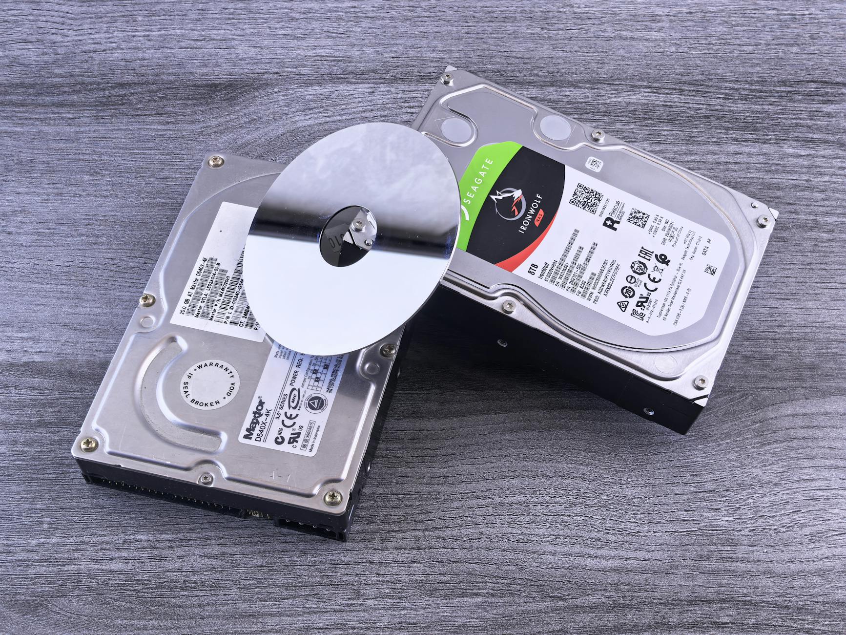 External hard drive and SSD storage devices arranged on desk