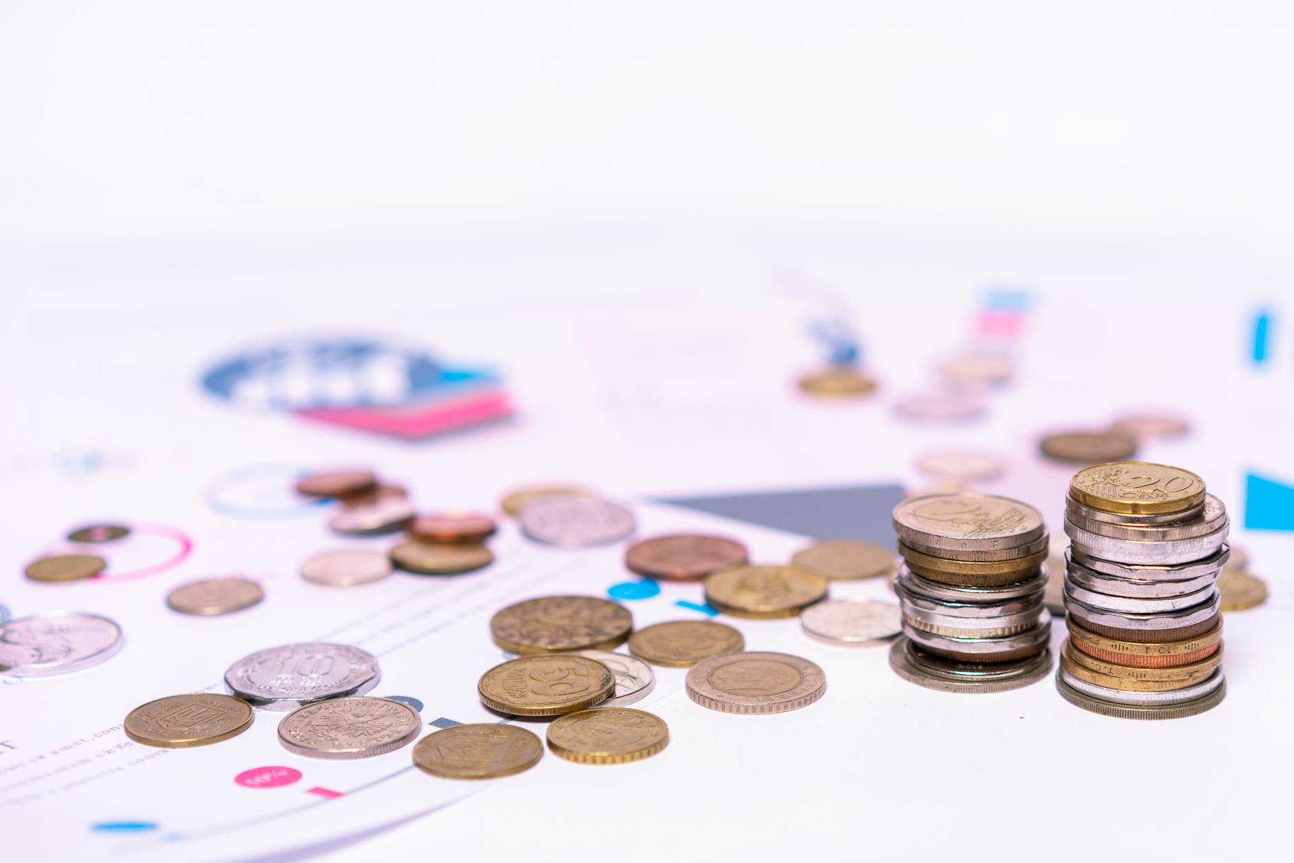Calculator and financial documents showing budget allocation and prize distribution calculations