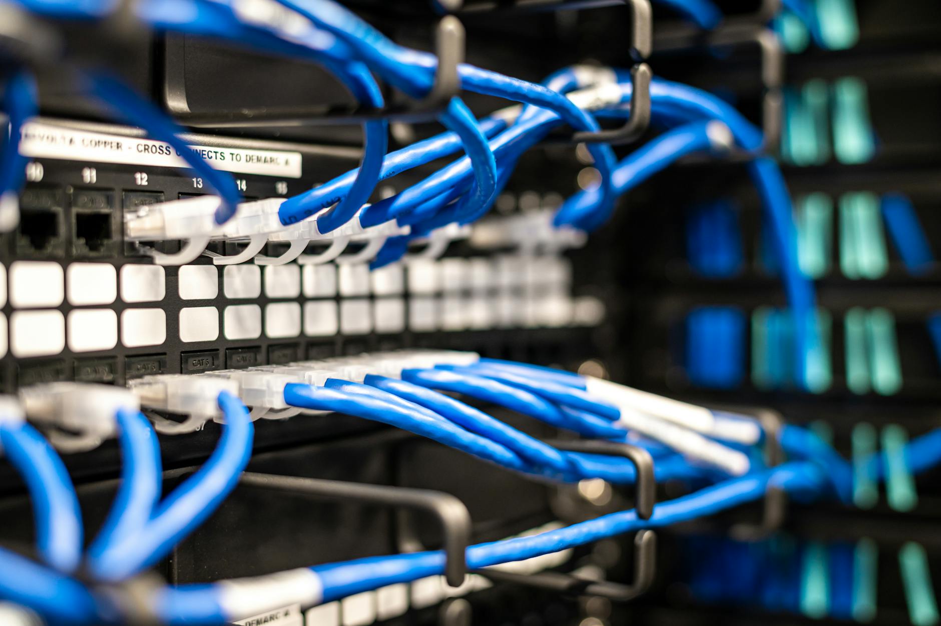 Organized computer cables and wire management behind desk