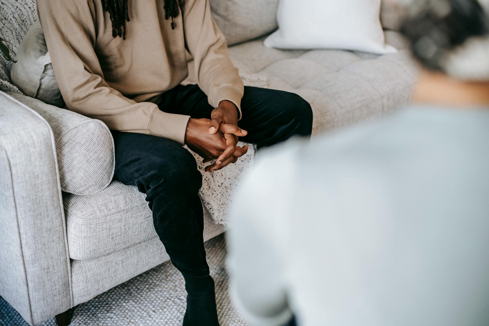 Mental health therapy session showing professional counseling support