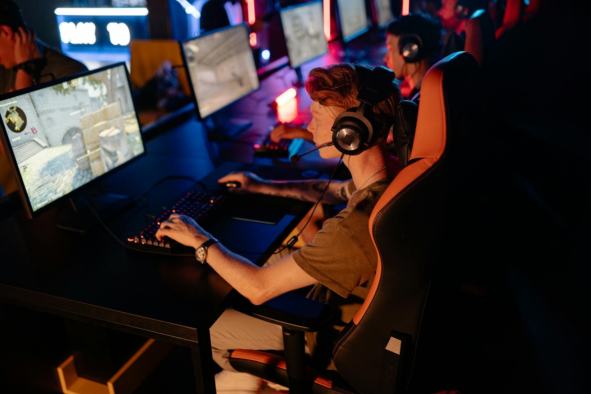 Gaming setup with monitor displaying colorful indie game graphics