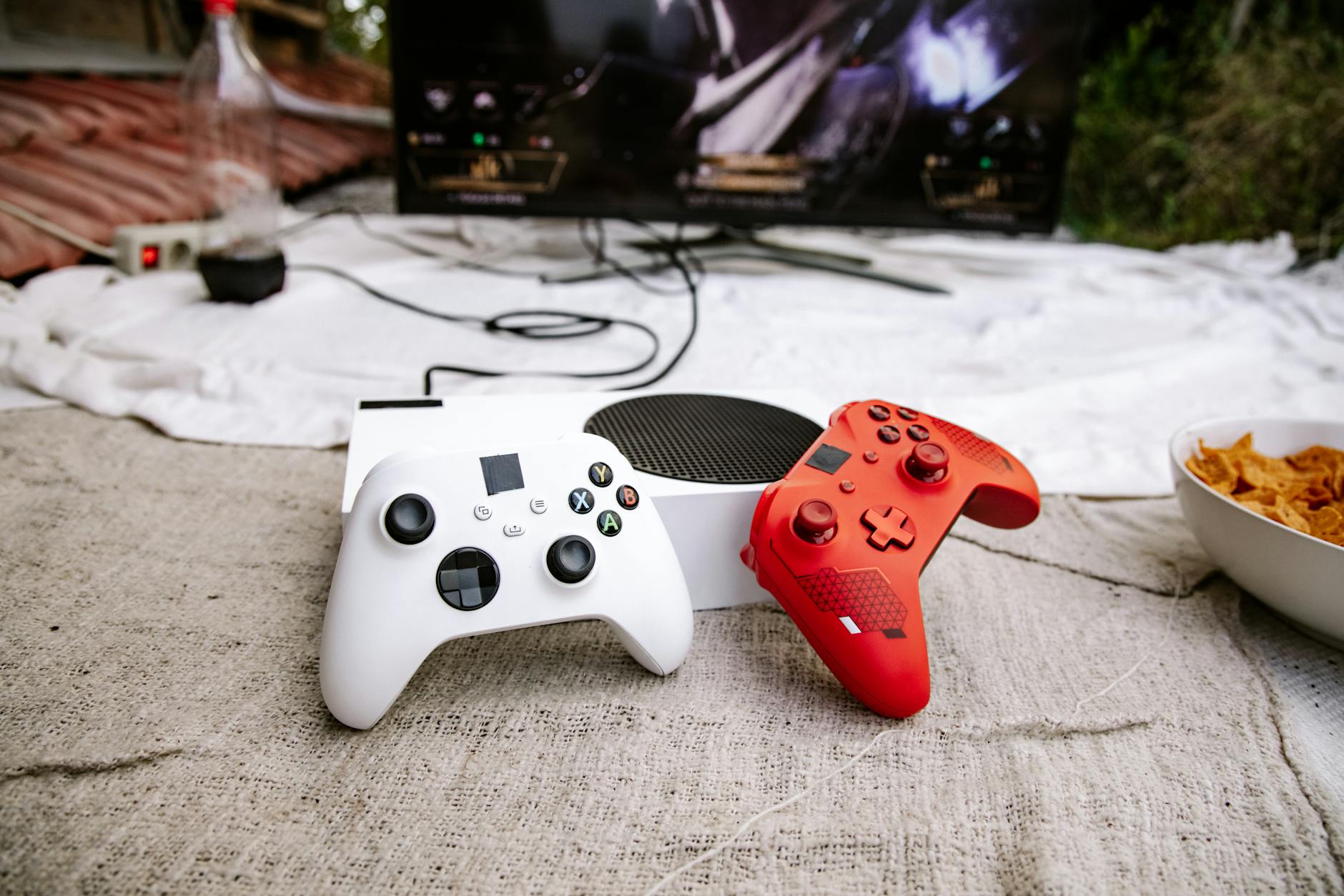 Gaming setup with controllers and modern technology equipment