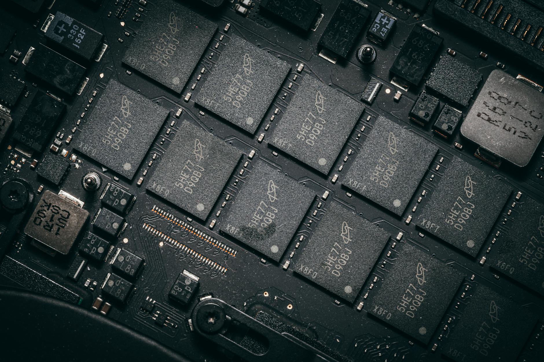 Close-up view of computer circuit board components and electronic pathways