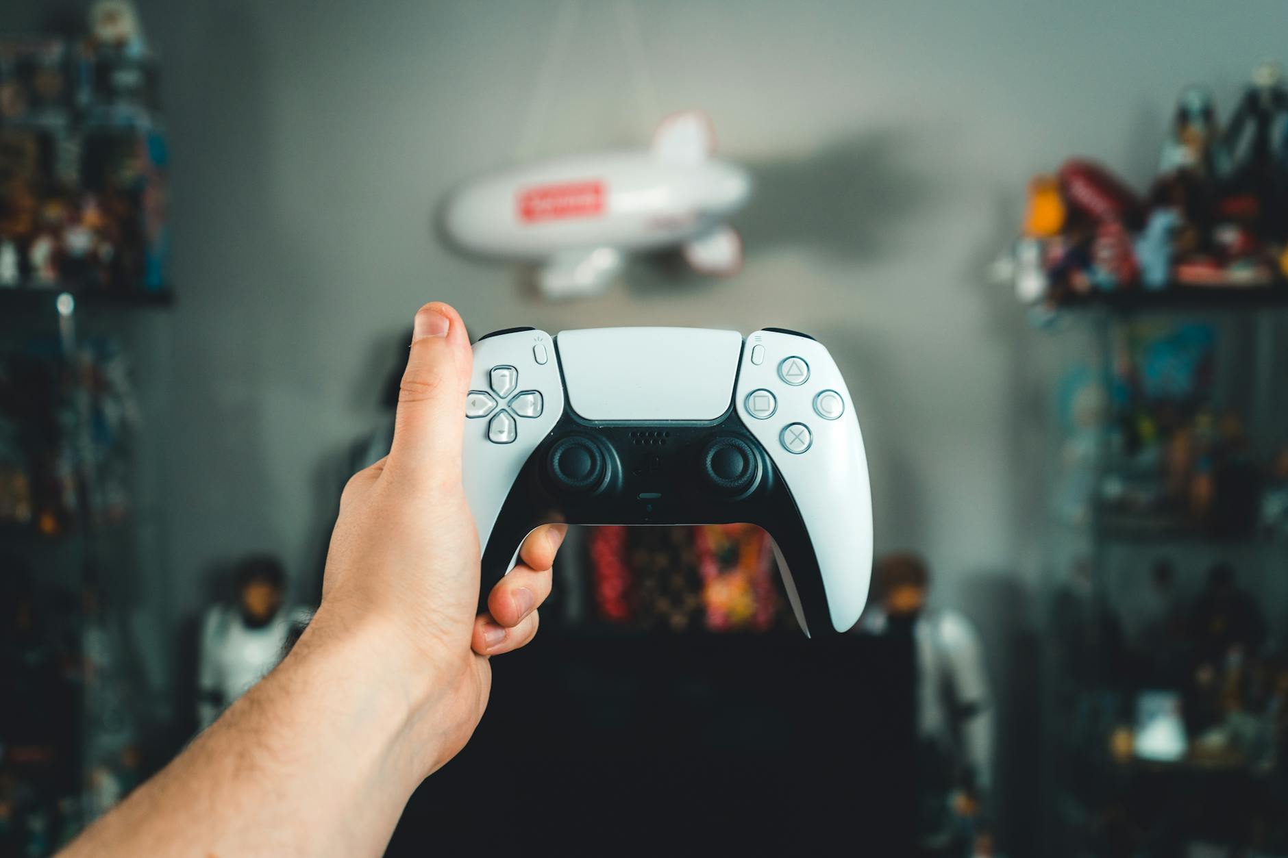 Hands holding gaming controller representing player experience and verdict