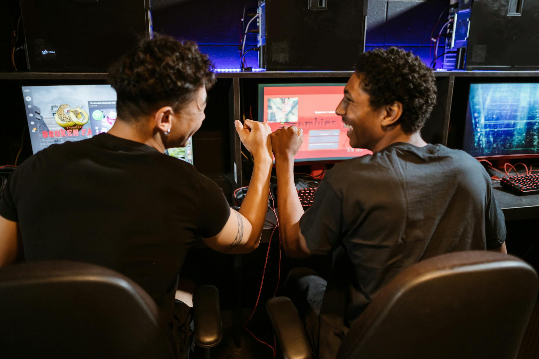 Team of gamers playing cooperatively representing multiplayer Zombies gameplay