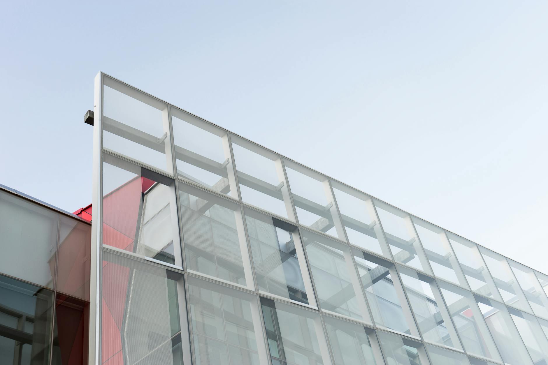 Modern corporate technology building exterior with glass facade