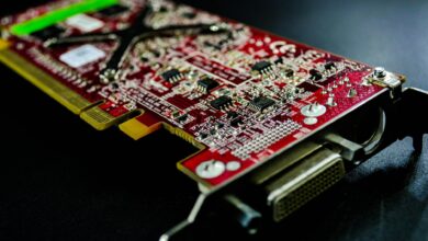 Close-up of a discrete graphics card with visible cooling fans and PCIe connectors