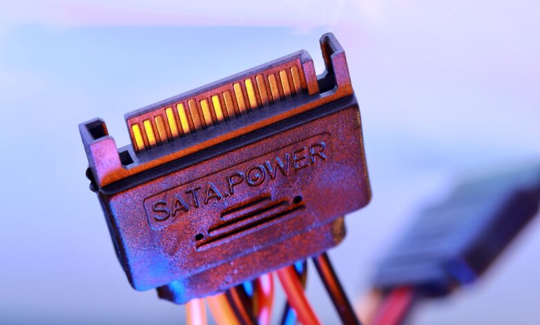 Close-up of a modular PC power supply unit with cables attached