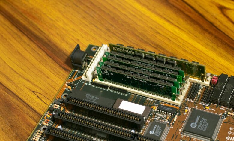 Two DDR5 memory kits installed in a high-end gaming PC motherboard