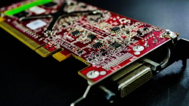 Nvidia RTX 5060 Ti graphics card on a dark surface showing VRAM configuration