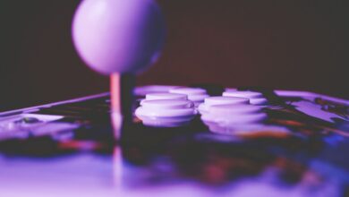 A game controller resting on a surface, representing competitive fighting game play