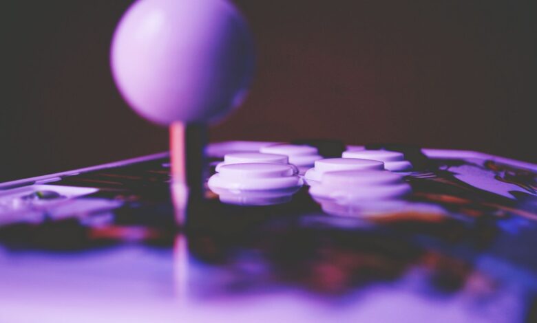 A game controller resting on a surface, representing competitive fighting game play