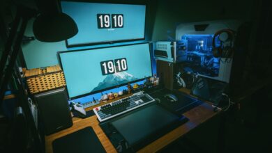 A high-resolution gaming monitor on a clean desk setup showing a vivid game scene