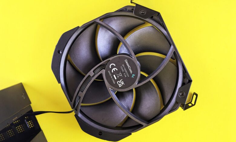Close-up of a high-performance CPU air cooler with ARGB lighting installed on a desktop PC motherboard