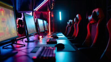High-end gaming PC desktop setup with multiple monitors for 4K gaming benchmarks