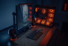 High-end gaming PC setup with glowing RGB components on a desk