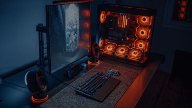 High-end gaming PC setup with glowing RGB components on a desk