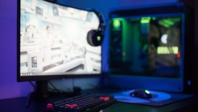 A high-performance gaming PC setup with RGB lighting, representing mid-range GPU comparisons
