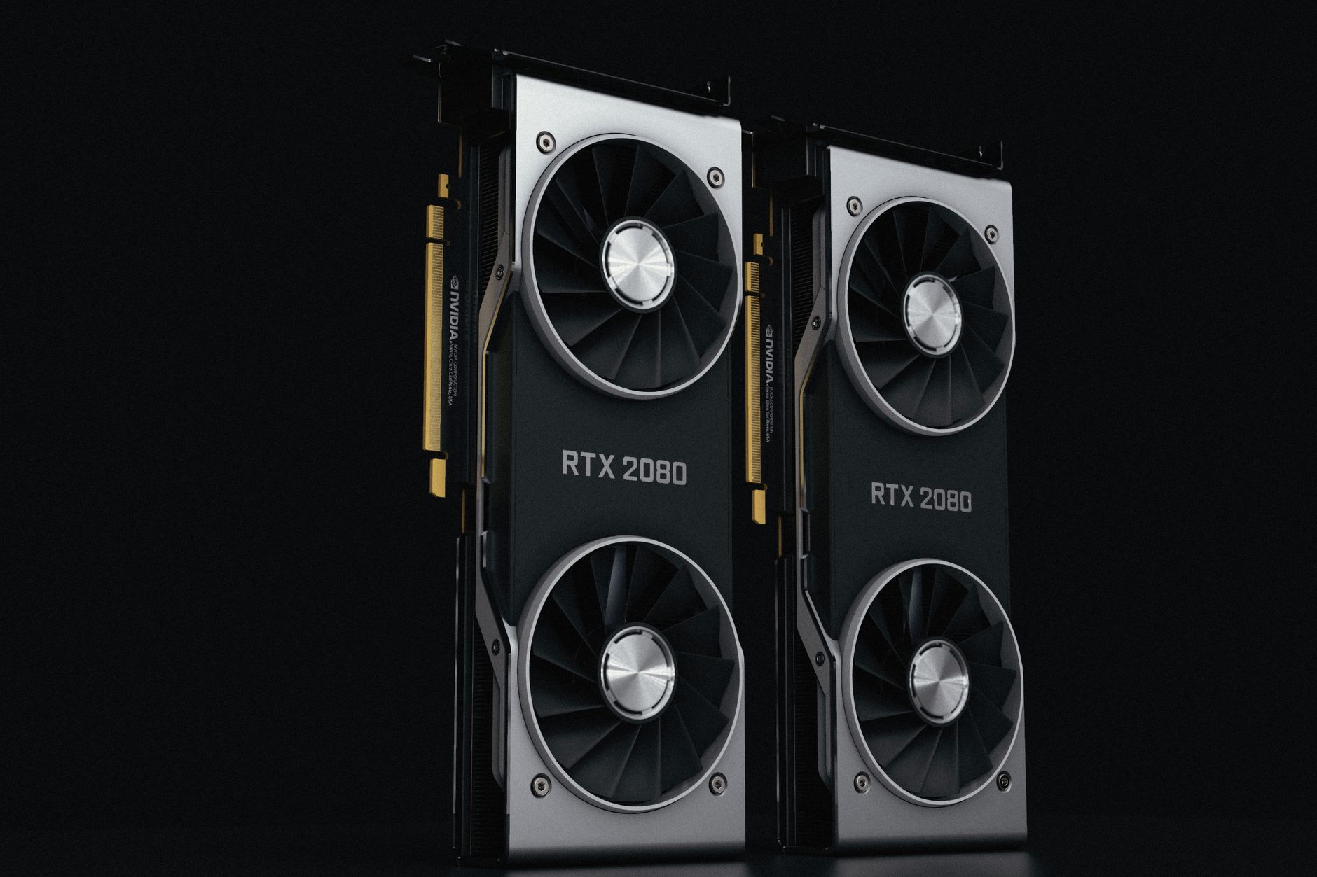 Close-up of a graphics card installed in a PC case with visible cooling fans