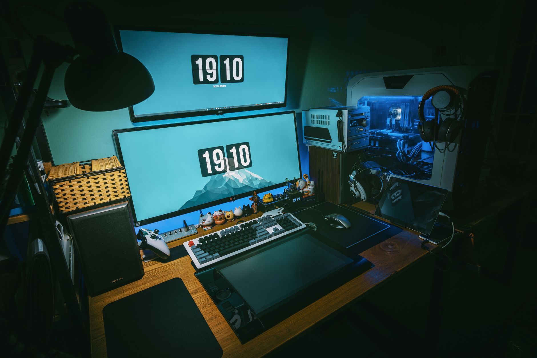 A 1440p gaming monitor on a desk displaying a colorful game scene
